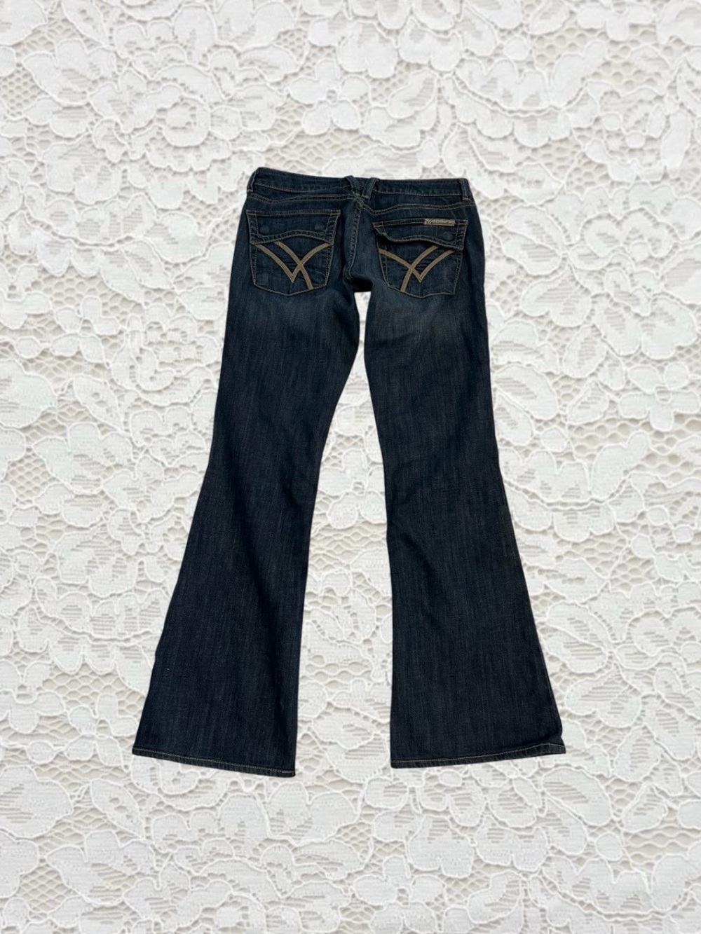 vintage y2k dark wash low rise flare jeans with cute butt pockets